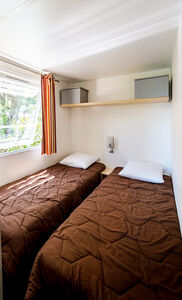 Calme et confort des chambres du mobile-home haut de gamme Privilège®