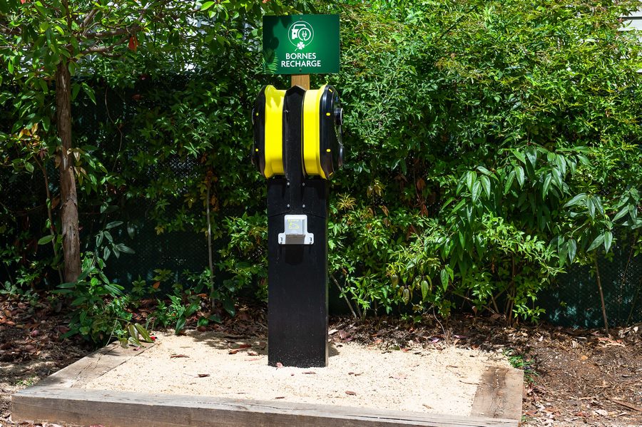 Electric vehicle charging stations at the campsite.