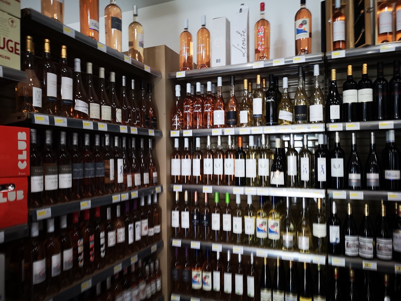 Friendly-priced Provence wines for sale at the campsite's mini market Provence wines on sale at Les Jardins de La Pascalinette campsite shop in La Londe